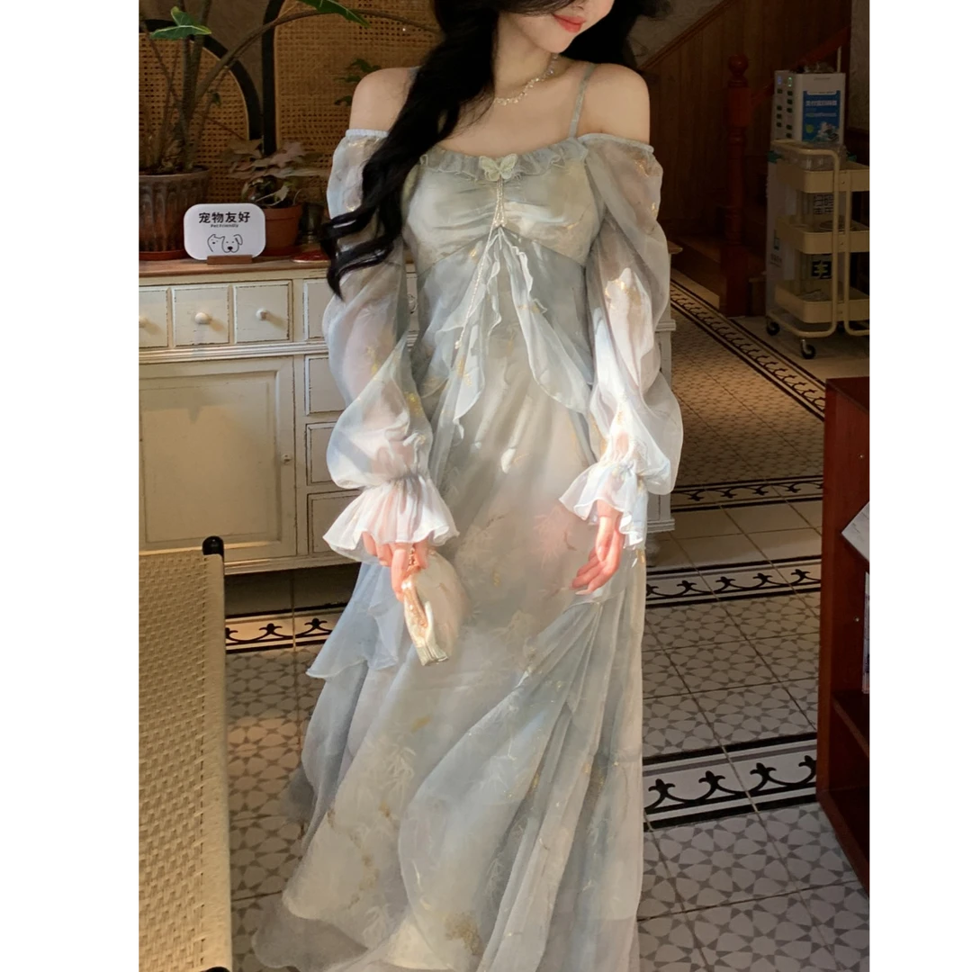 2025春夏海边旅游气质灰蓝色晕染仙气蝴蝶烫金荷叶边长袖连衣裙女