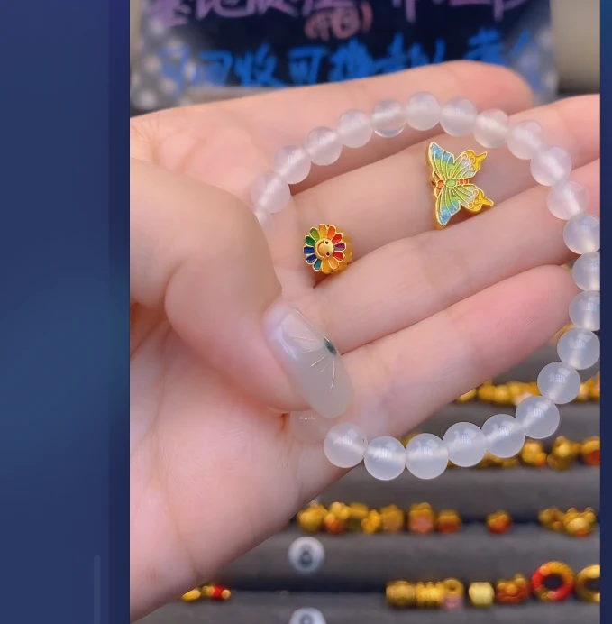 足金999太阳花+蝴蝶玛 瑙手串/ 多样性发