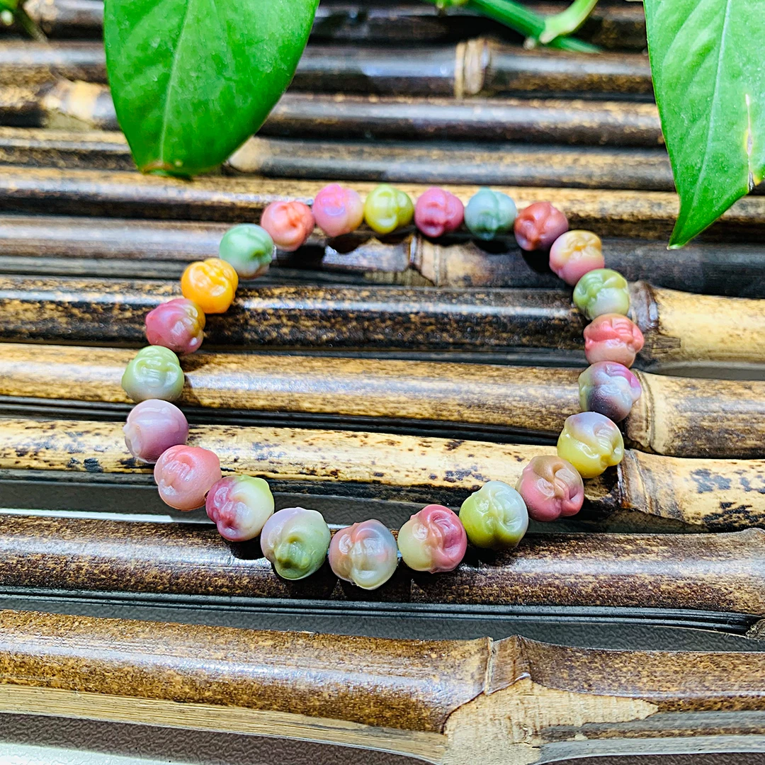 天然老矿七彩盐源玛瑙精雕浓彩色弥勒佛头手串