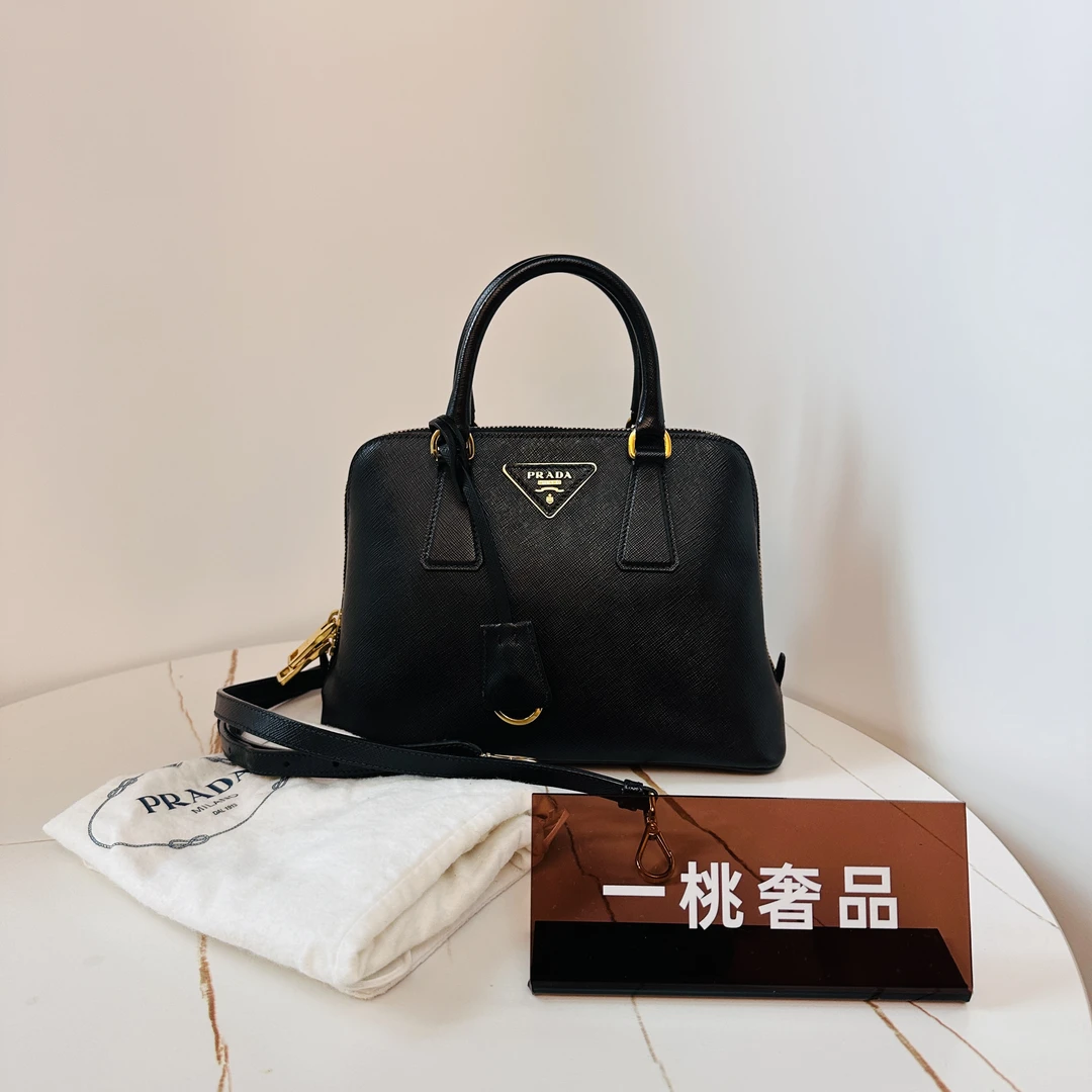 95新 Prada/普拉达 一桃/实际98新/普拉达 黑色贝壳手提斜挎包