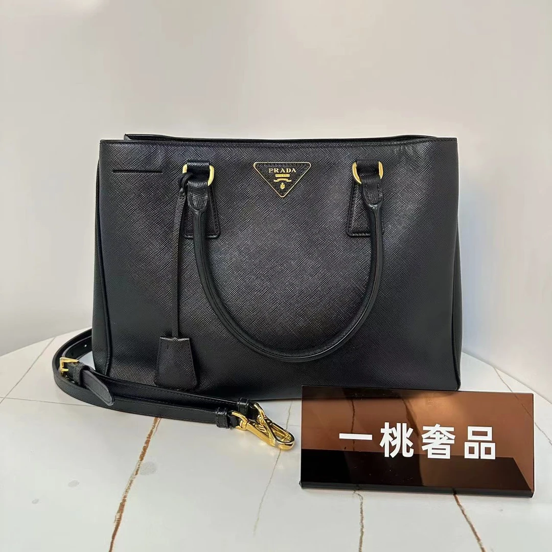 95新 Prada/普拉达 一桃/实际97新/普拉达 杀手黑金手提斜挎