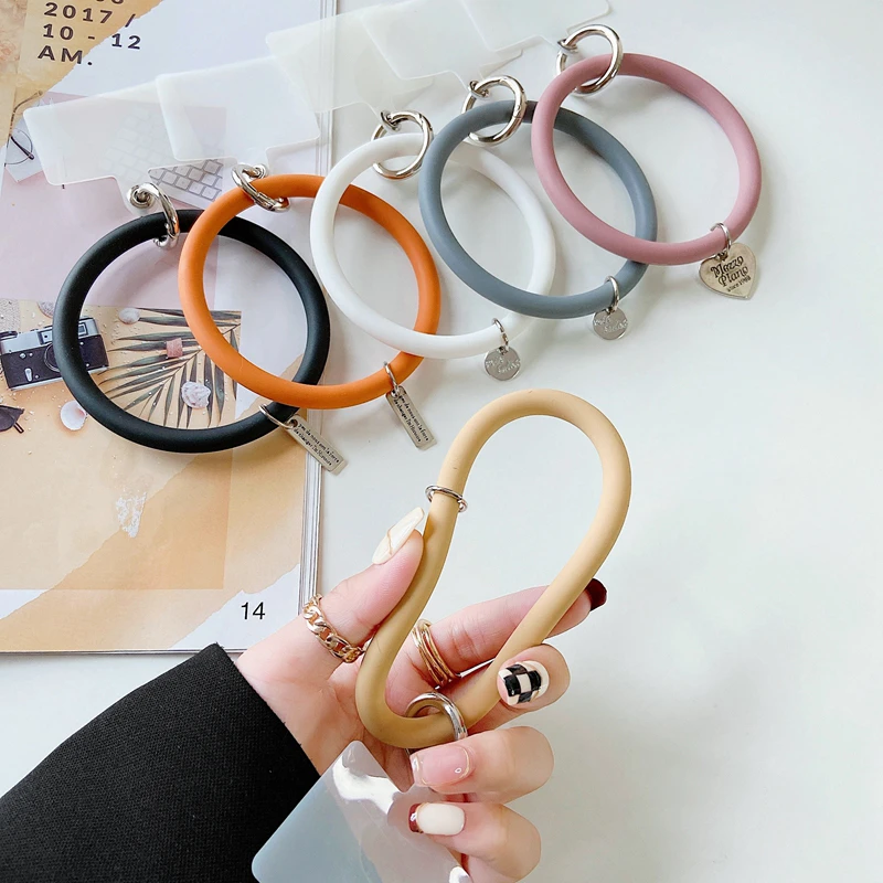 【新疆特惠】手机挂绳手环手机壳挂环扣防掉防丢腕带圈环硅胶手腕ZT