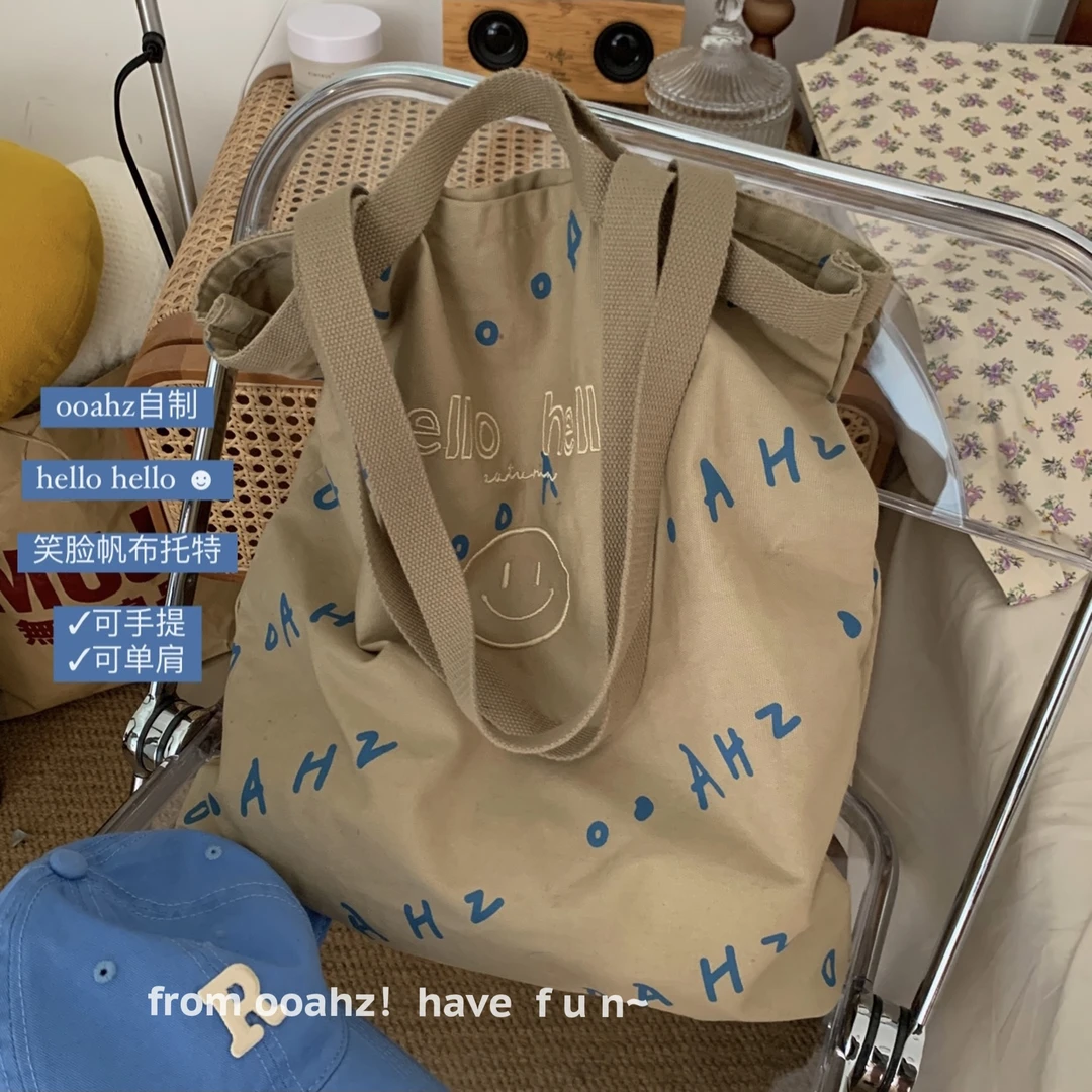 hello：最近还好吗？笑脸字母单肩包大容量帆布包包女爆款ooahz