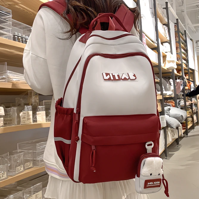 双肩包女大学生百搭韩版初中生小学生双肩背休闲女高中生书包男潮