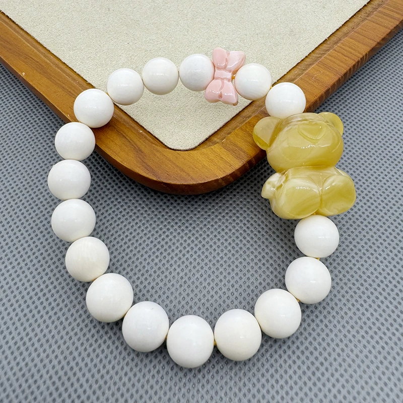 天然猛犸牙圆珠手串时尚精美百搭可爱款配小熊多样性发货其一