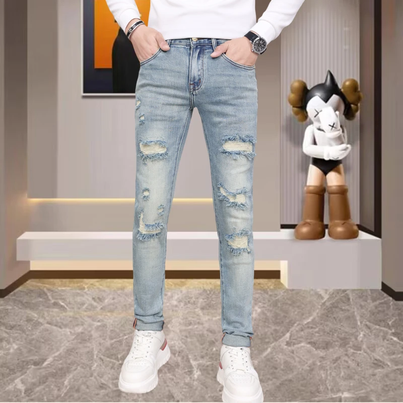 高奢欧货5878秋季新款时尚假破洞弹力修身小脚牛仔裤补丁长裤男