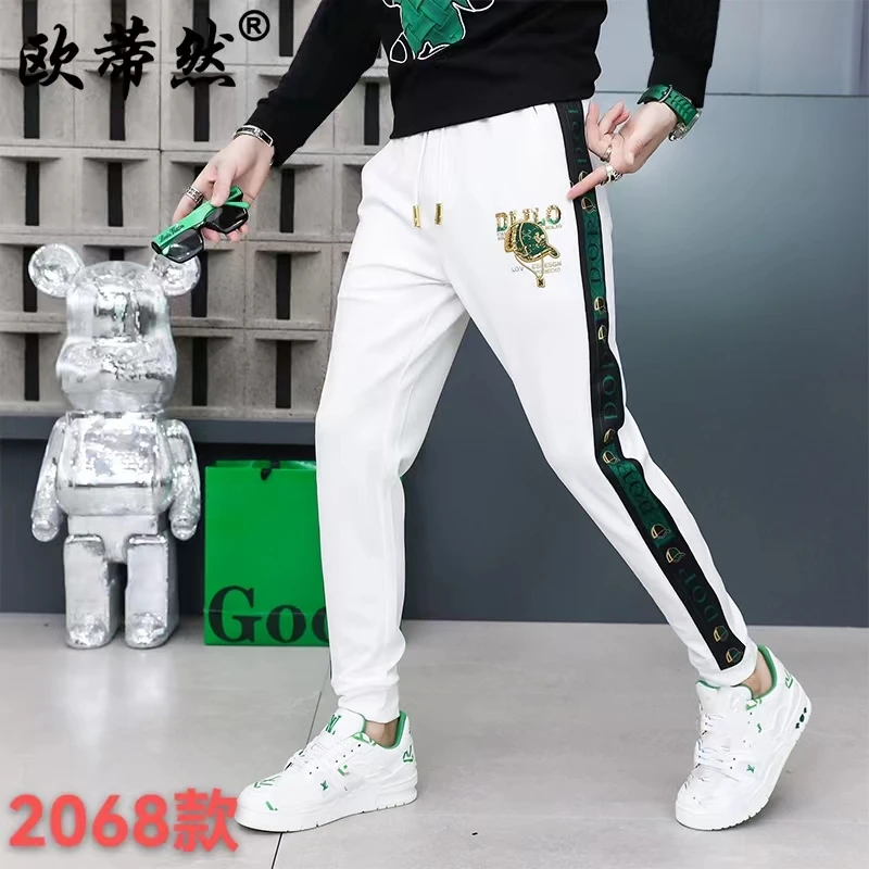 春夏男士韩版休闲裤秋季潮流裤子男款百搭时尚轻奢绣花修身卫裤