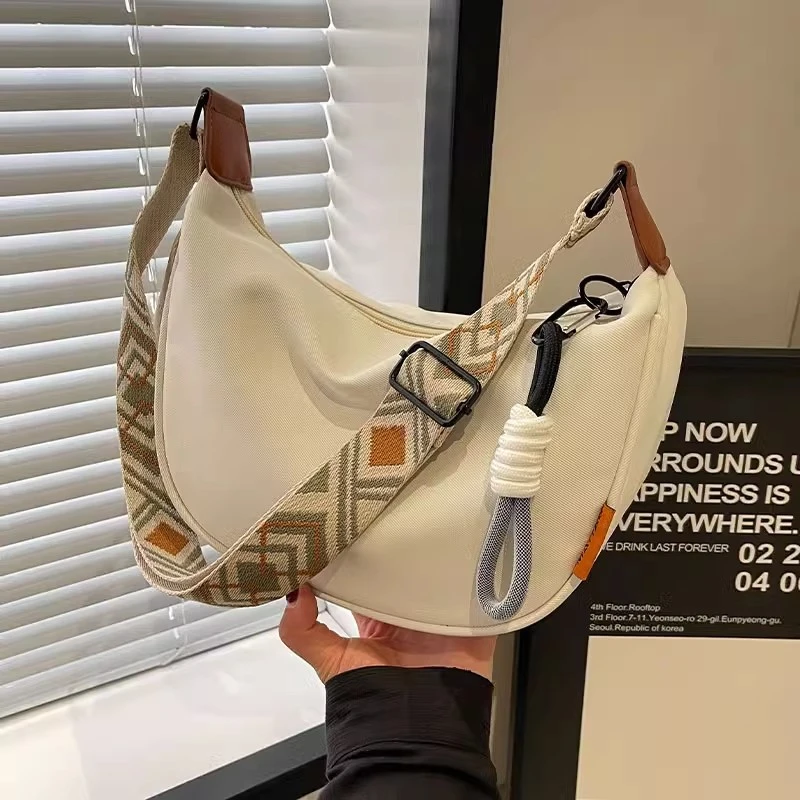 包包女式2024新款秋冬休闲女包斜挎饺子包帆布包单肩通勤包腋下包