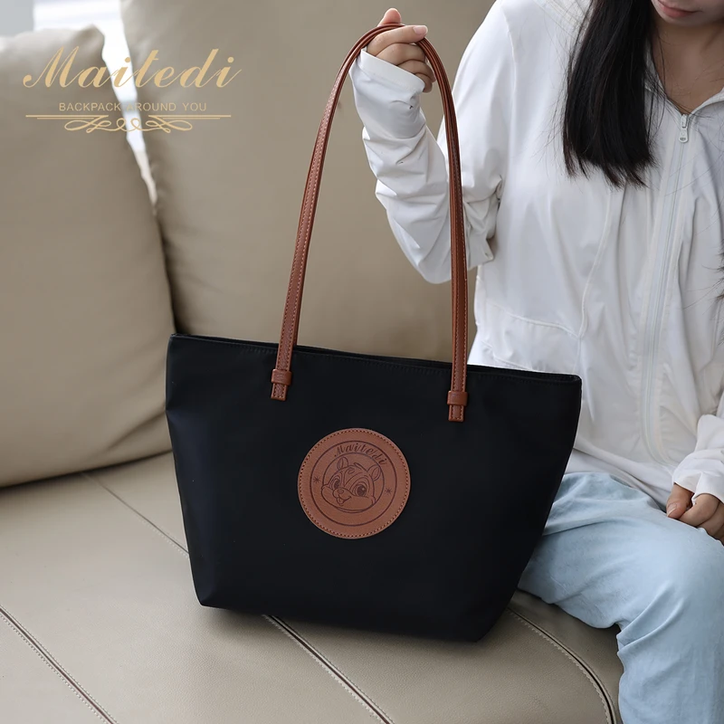 迈特蒂2025春夏新款时尚女士包包休闲简约百搭大容量单肩托特包