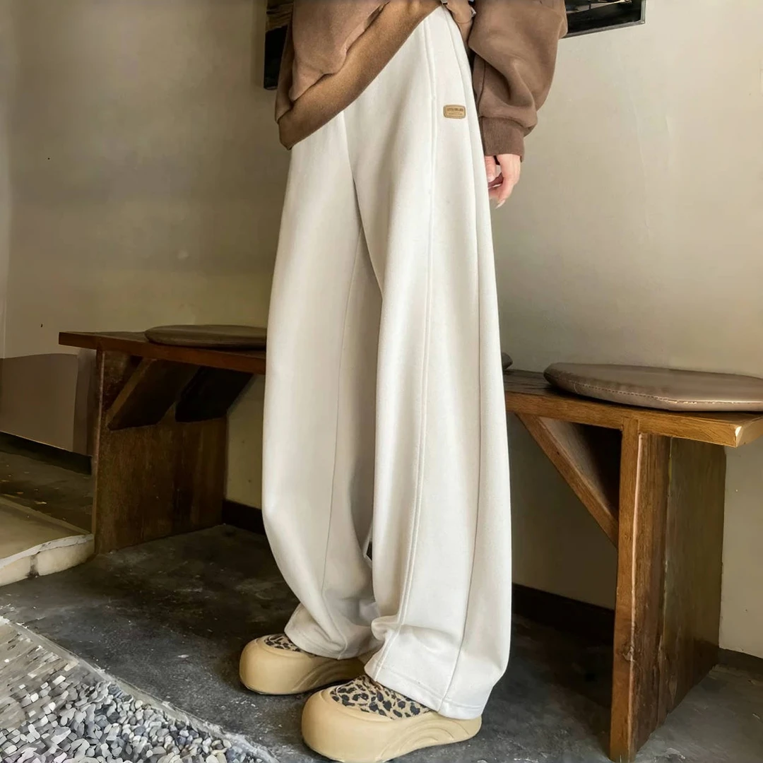 恰照梨雪 / 长绒款显瘦遮肉香蕉裤13102花契200斤胖mm休闲时尚