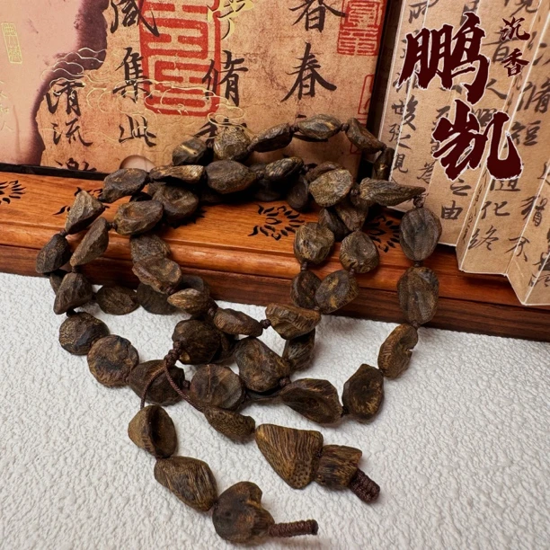 沉香【毕业沉水】海南莺歌绿棋楠随型长串沉水级30g+（多样性发一）