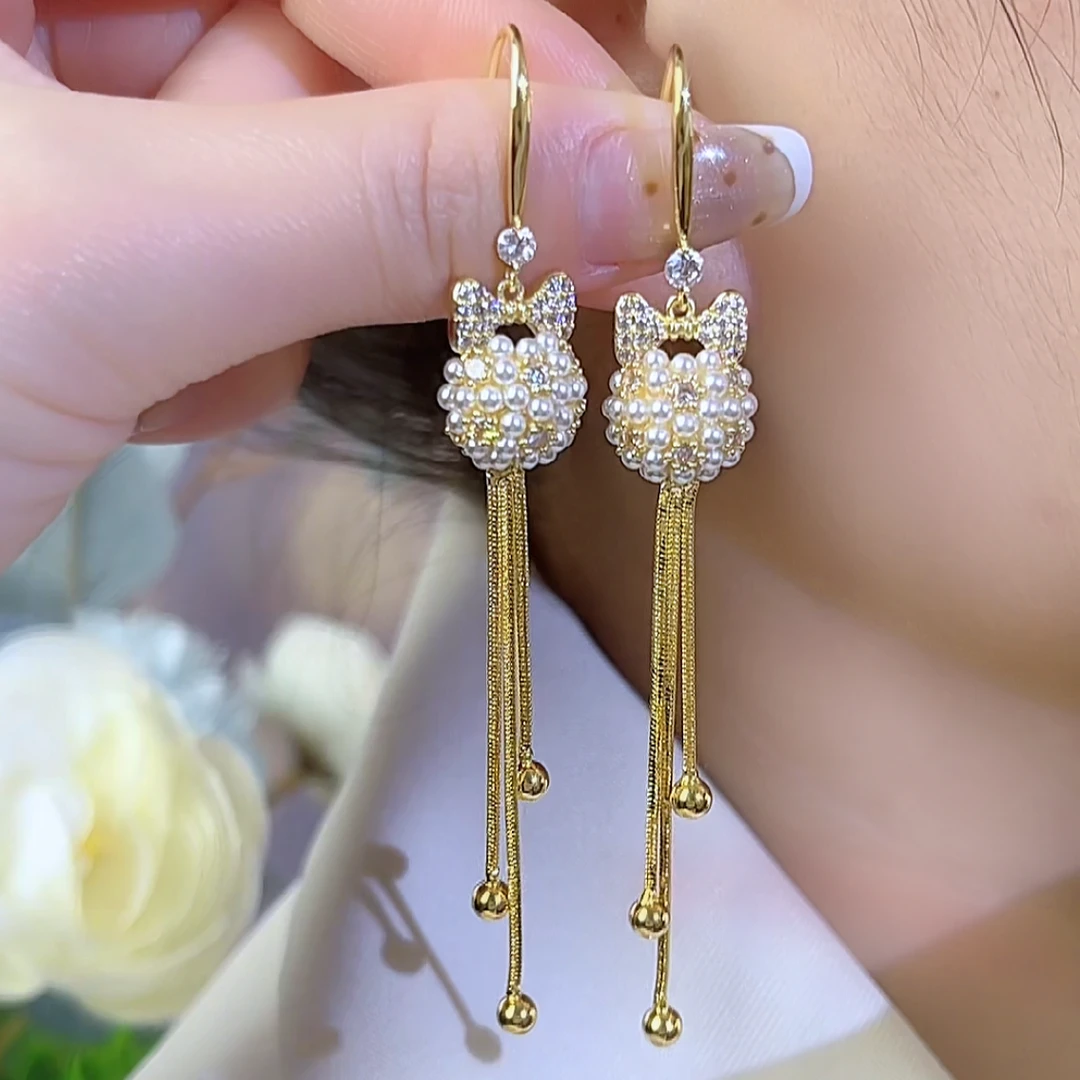 铜合金仿珍珠耳饰 小众时尚设计感气质小米珠绣球流苏耳环1012