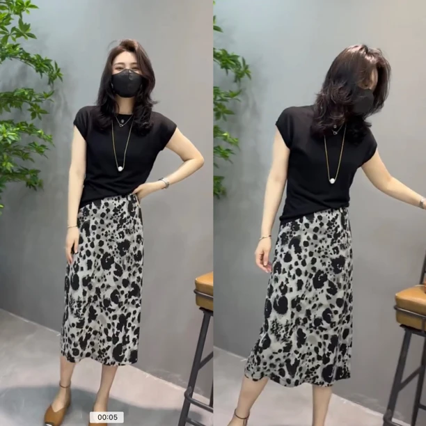 2024中长款豹纹半身裙女夏季新款修身显瘦松紧腰碎花A字裙后开衩