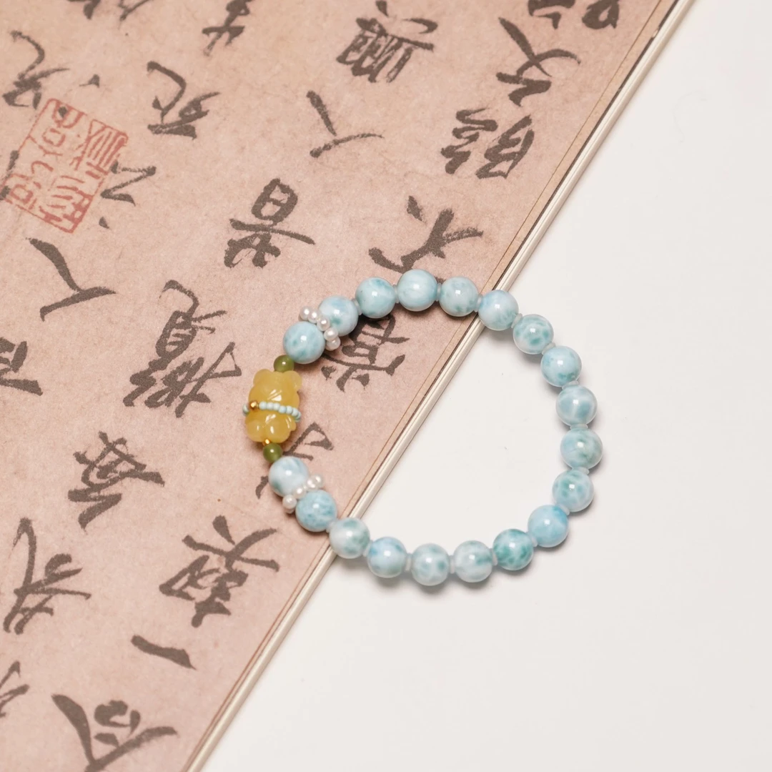 海纹石蜜蜡小熊手串ZC10A107003