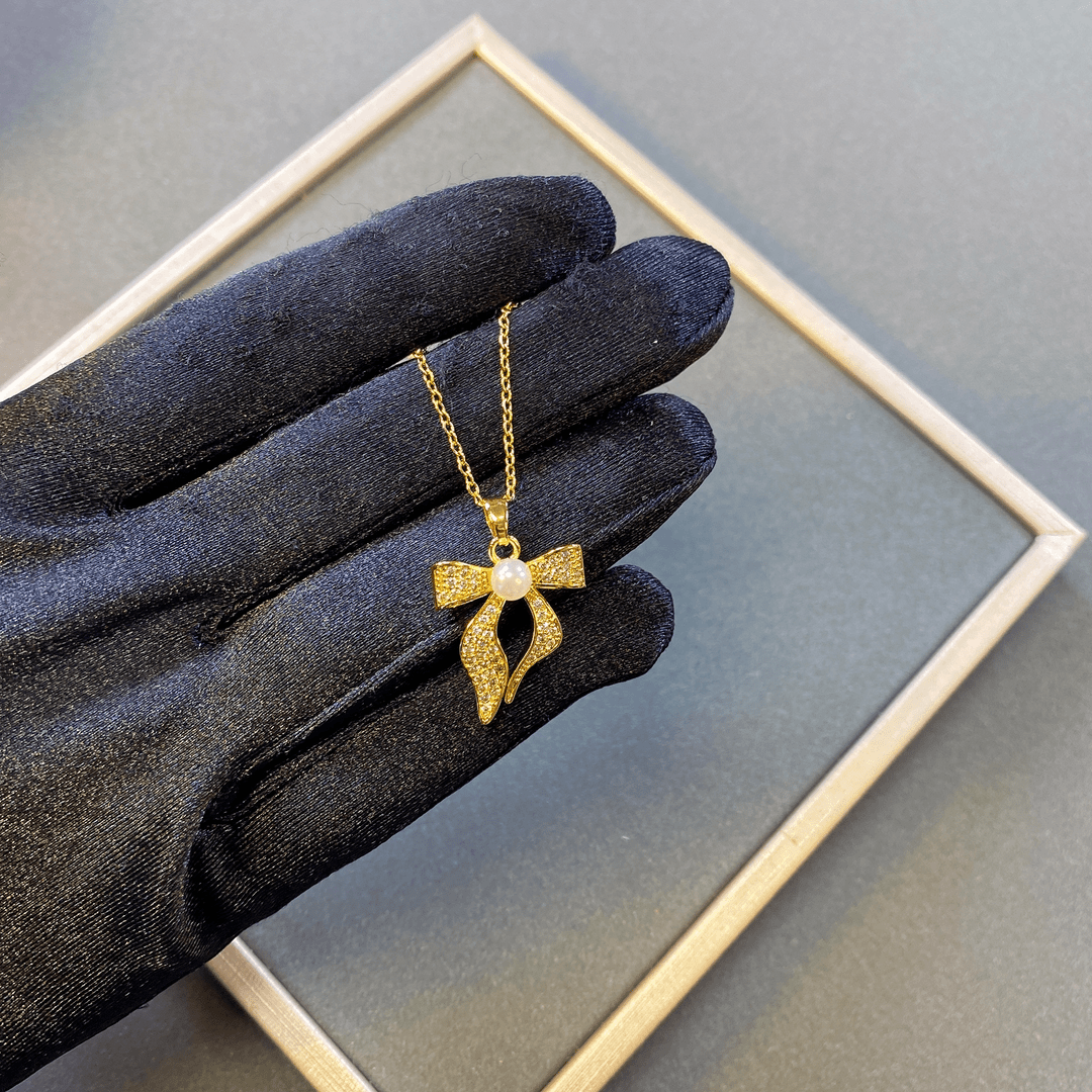 钛钢项链 ——奶酪  (592号)  蝴蝶结简约项链