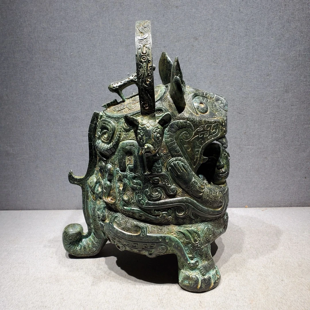 古铜坊复刻商晚期青铜器虎噬人卣提梁仿古青铜器