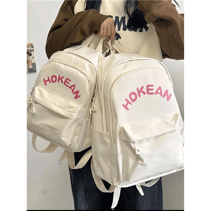 女大学生时尚简约书包日系初中高中生百搭上课双肩包韩版旅行背包