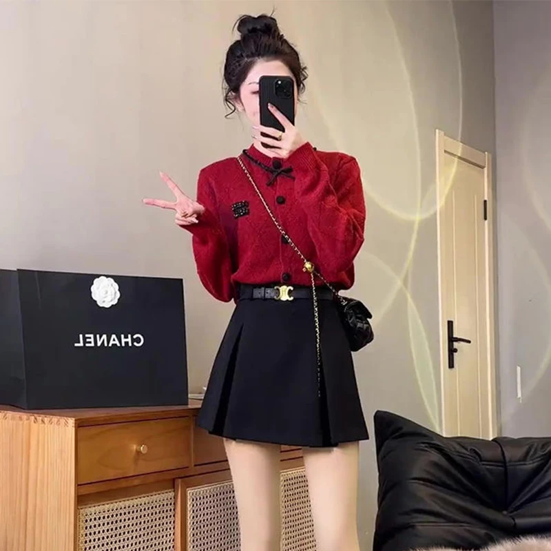 韩版小个子气质减龄套装女2025年秋季蝴蝶结圆领针织开衫A字短裙