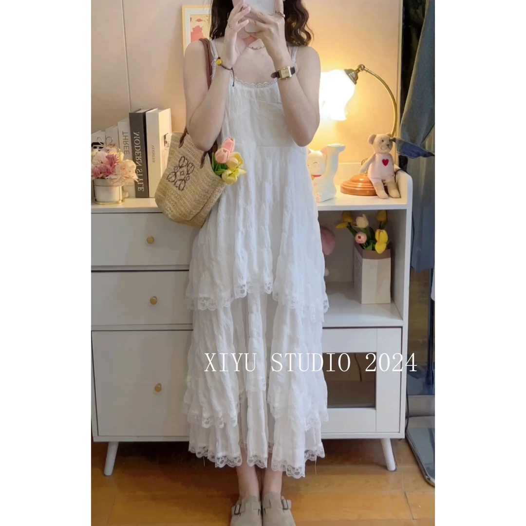 【喜雨】白色小众吊带连衣裙春夏2024年新款海边度假吊带裙超仙300#