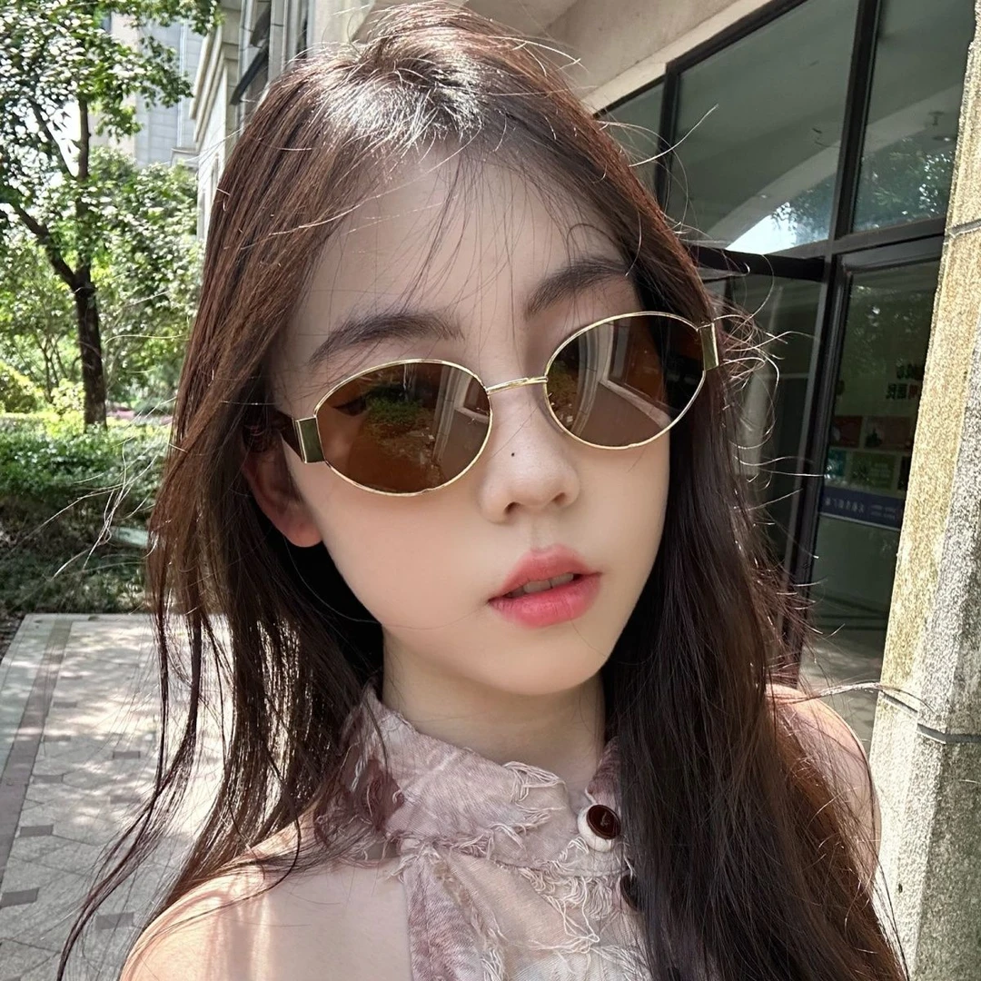 猫眼墨镜女款高级感2024新款金属小脸椭圆形复古小框茶色太阳眼镜