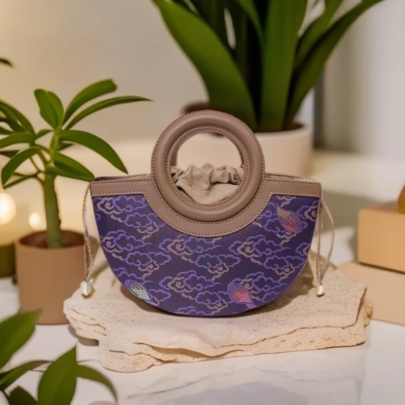 素妍国风宋锦紫色祥云纹小号手拿斜挎包