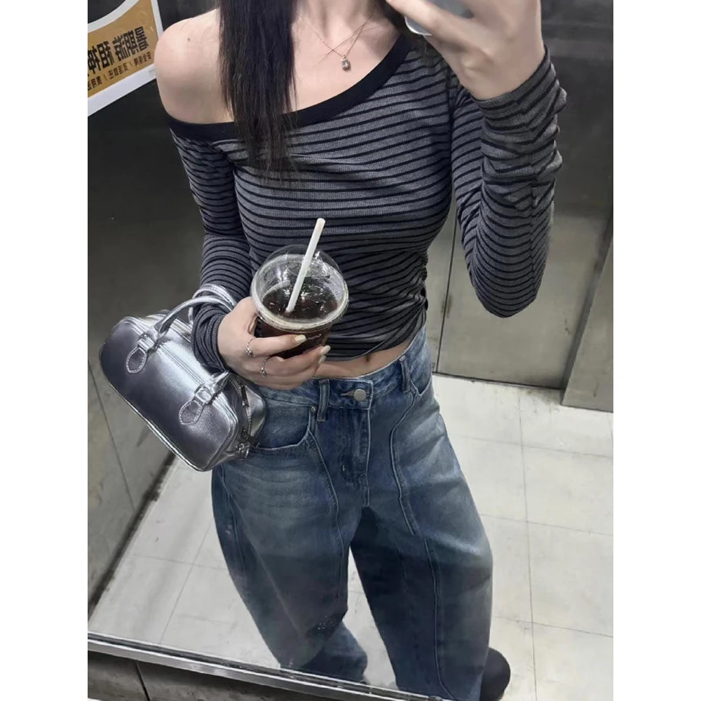 一字领斜肩条纹长袖t恤女秋季内搭打底衫辣妹别致修身短款小上衣