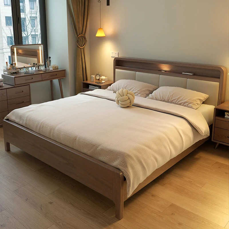 现代简约实木双人床2024新款高档黑胡桃木北欧民宿酒店1.8米大床