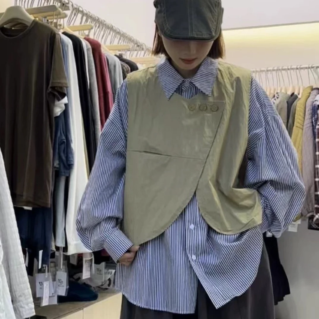 | 大大 | We家 | 7954#日式小众设计感不规则无袖马甲 |