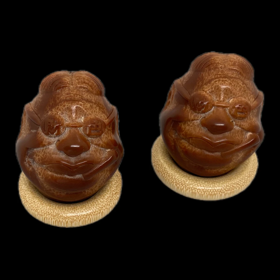 大亨财色双收手把件——橄榄文玩