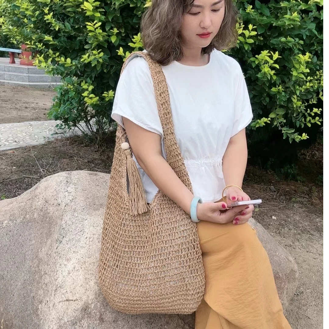 A02流苏草编包沙滩度假休闲包2024新款夏季单肩包慵懒松弛感包包