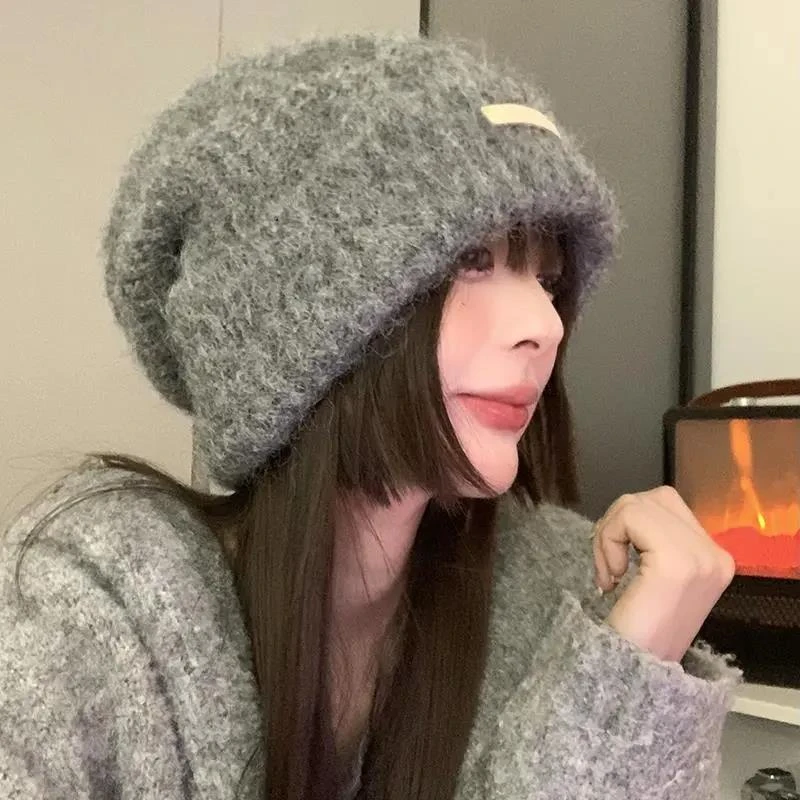 秋冬时尚毛线堆堆帽大头围百搭休闲冷帽保暖帽子情侣护耳针织帽