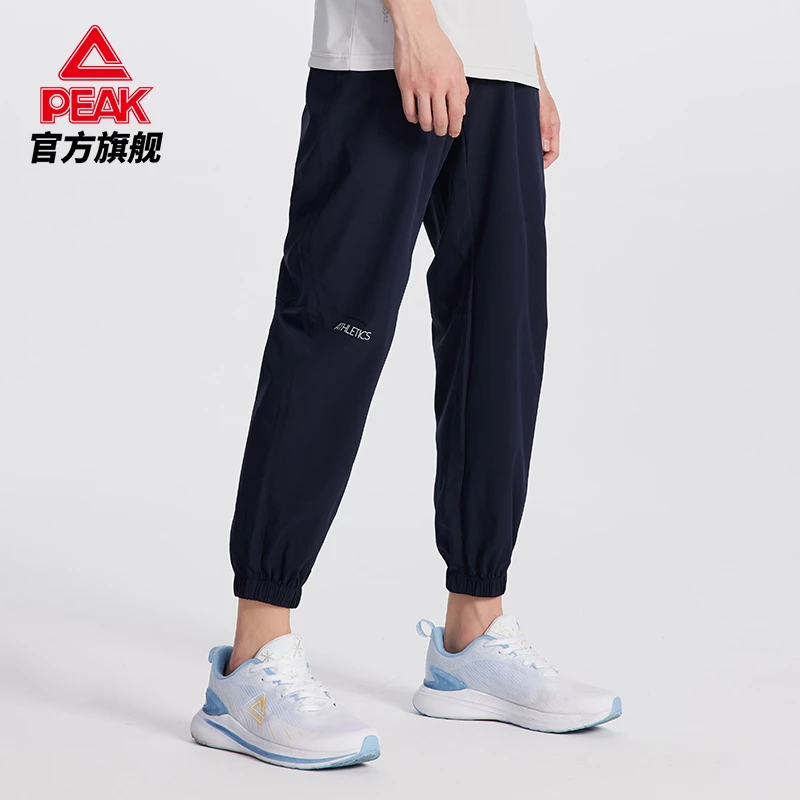 匹克梭织长裤男士透气宽松新款综合运动系列防风卫裤-DF322031