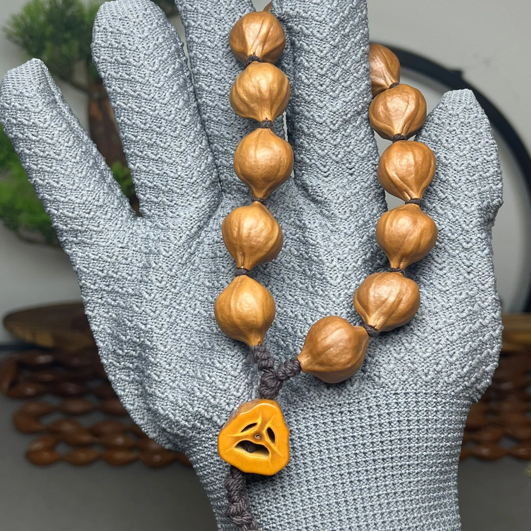 广西橄榄核老树铁核圆珠料蒜头原籽单圈手串1.6尺寸带囧脸