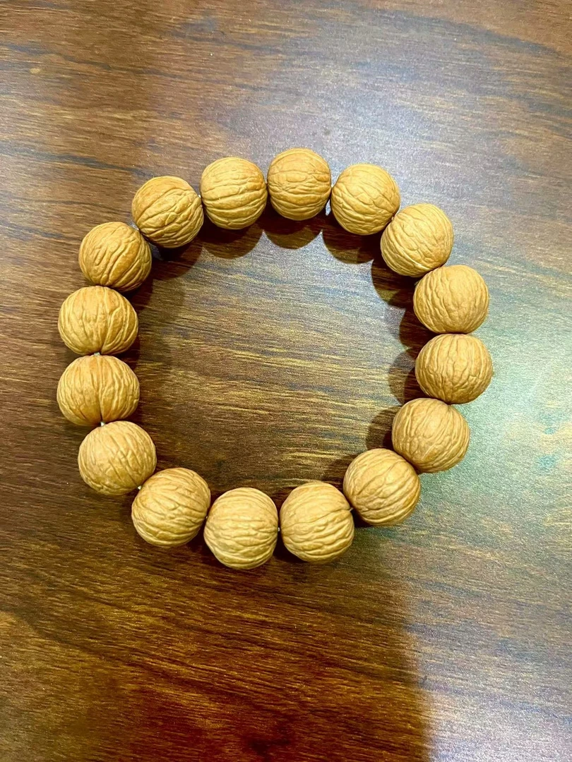 静檀文玩猴头手串（凤羽16+）