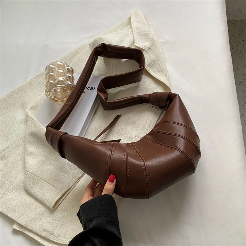 法国小众设计牛角包女秋冬高级质感可颂包斜挎包女学生饺子包包