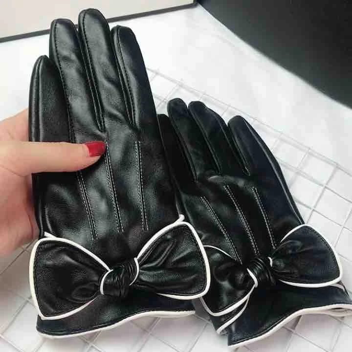 触屏款绵羊皮手套女士hellokitty当真洗脸时尚保暖新款绵羊皮手套