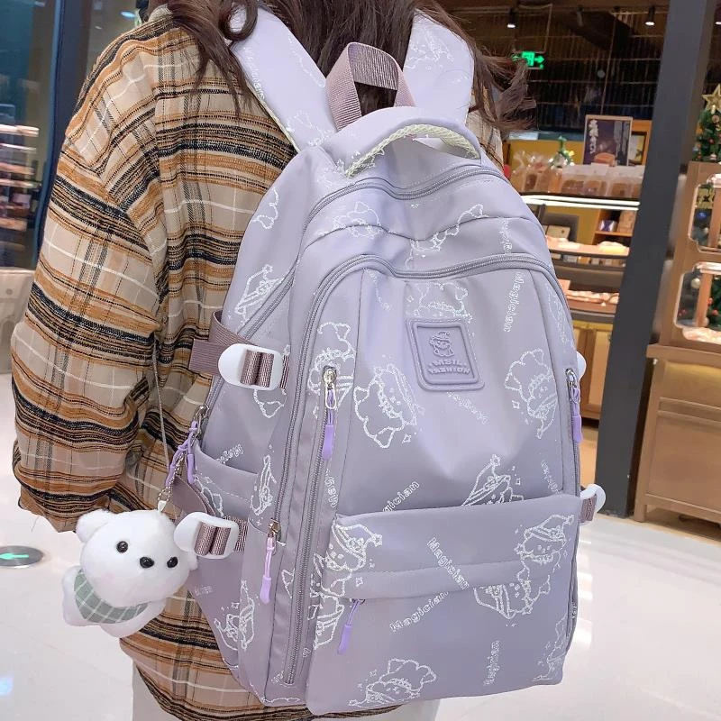 反光书包女三四五六年级卡通狗可爱背包初中学生大容量减负双肩包