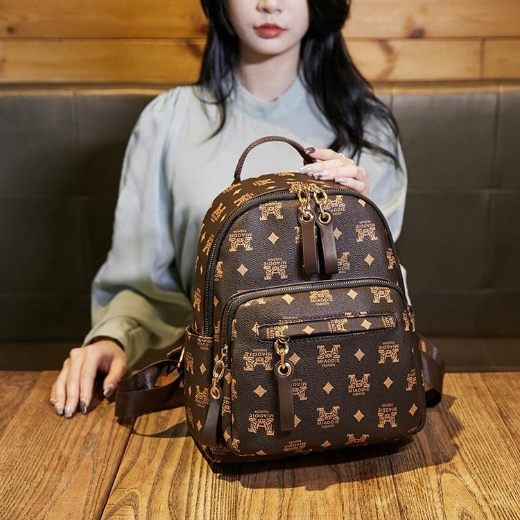 软皮质感双肩包女2023新款潮大容量时尚百搭旅行书包女士小背包包