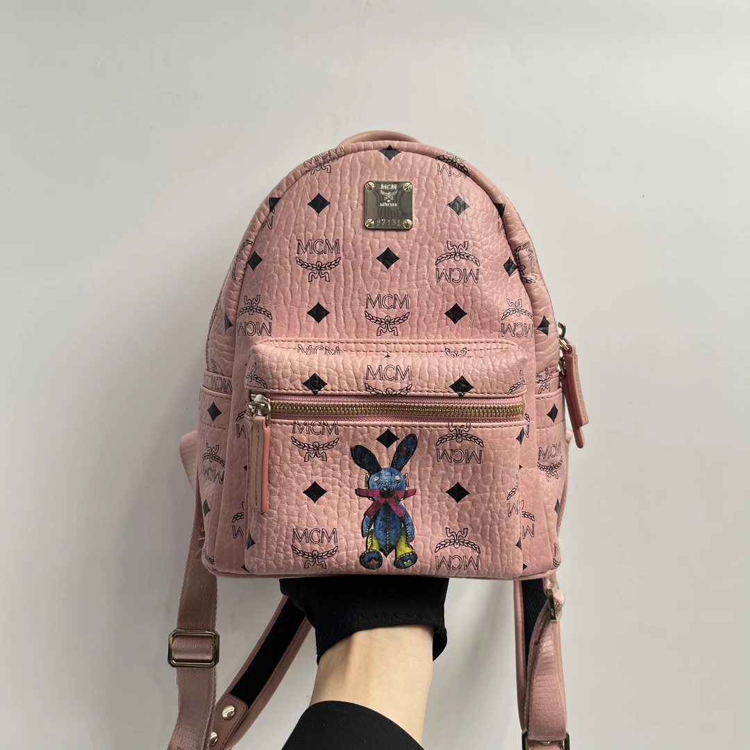 95新 MCM 粉色双肩包89160