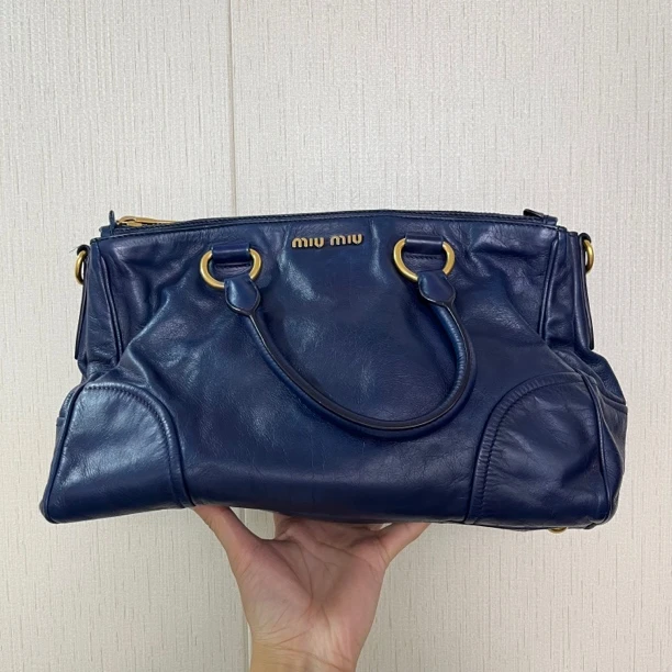 90新 MIU MIU/缪缪 蓝色杀手包66918