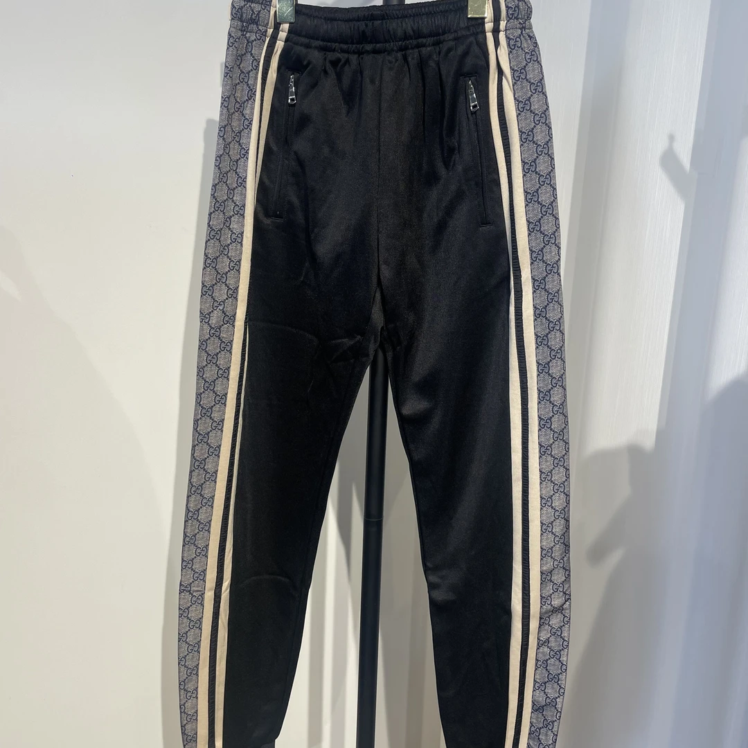 99新 GUCCI/古驰 古驰侧老花黑卫裤179