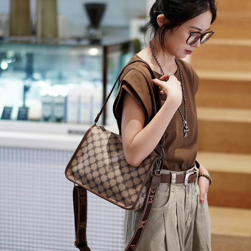 YIN.SIMON/茵熙曼2023新款爆款时尚百搭斜挎包女大容量豌豆饺子包