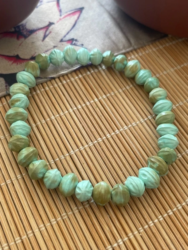 原矿绿松石百香籽手链 尺寸7.6mm 五图已盘走色