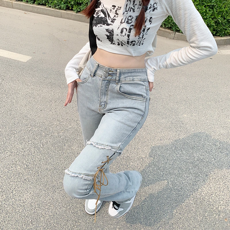 加长高个子辣妹别致小众设计感毛绑带牛仔裤女春秋季弹力微喇叭裤