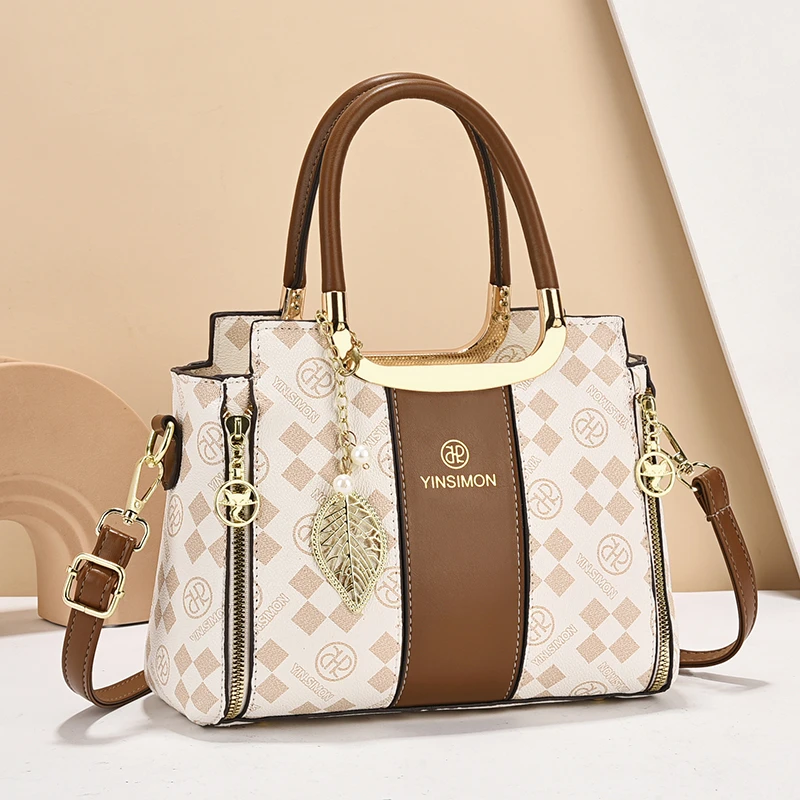 冬季今年流行斜挎包2025新款印花大小包包爆款妈妈包百搭单肩女包