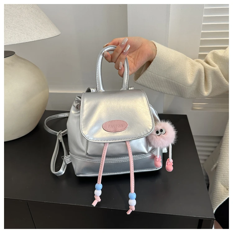 新款洋气学院风时尚个性撞色双肩包复古水桶包学生双肩包女小背包