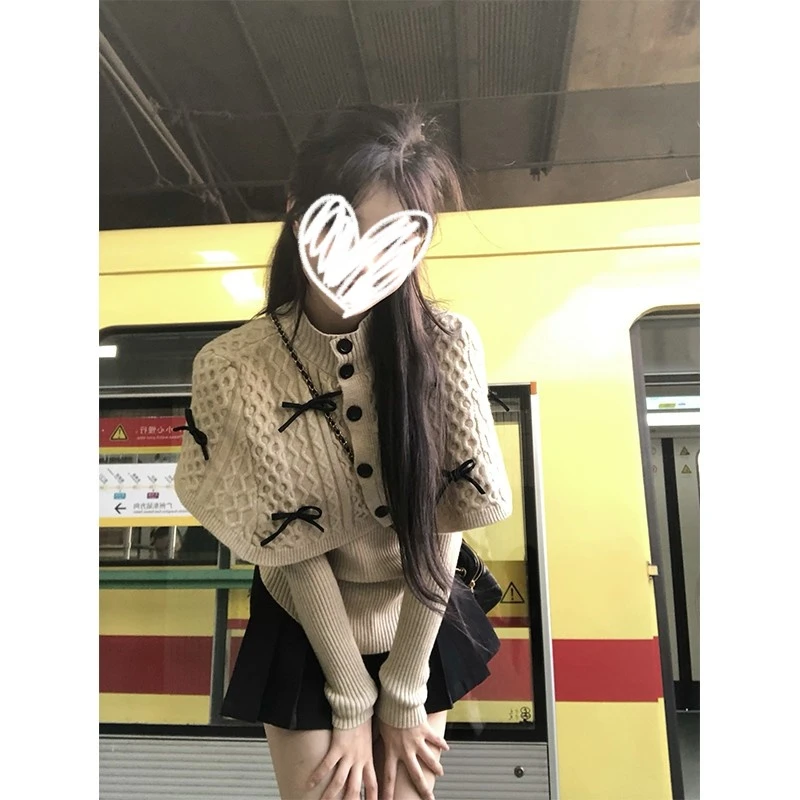 蝴蝶结针织衫小众叠穿披肩斗蓬上衣女冬季燕麦色毛衣黑色半裙套装