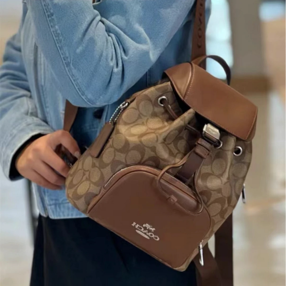 全新未使用 COACH/蔻驰 新款经典印花抽绳双肩包