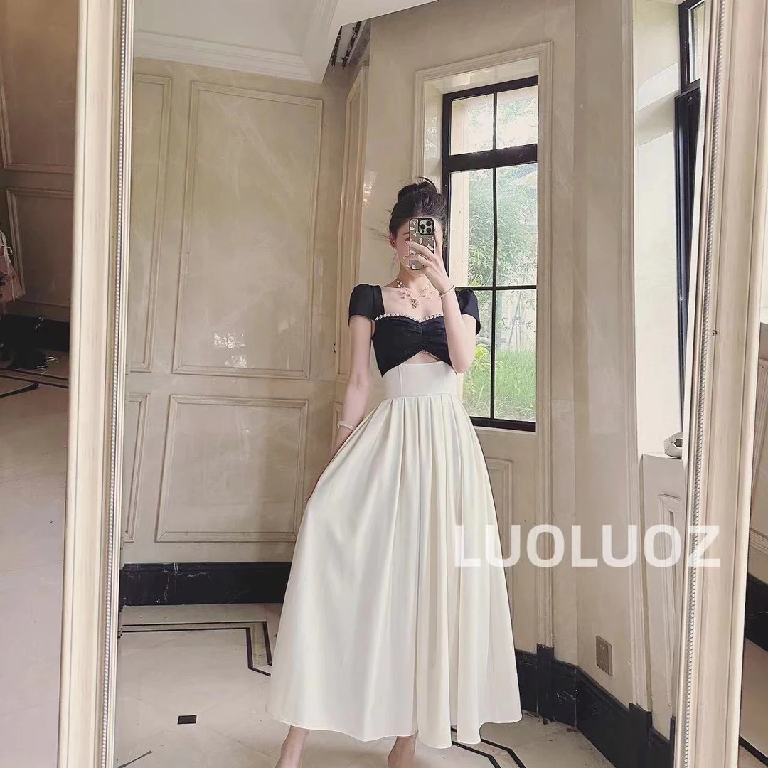 现货【梦境回廊】高级感气质撞色设计感镂空长款连衣裙H81720