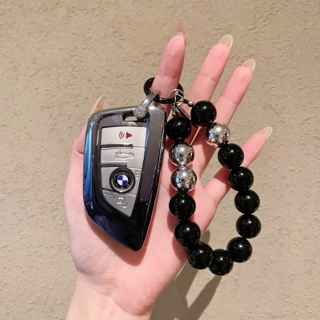 宝马钥匙套x1x2x3x4x5x6x7新款1系3系5系7系530高档刀锋壳扣包女